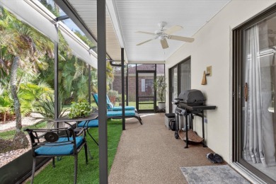 Welcome to this inviting 4-bedroom, 2-bathroom home located in on East Lake Woodlands Country Club in Florida - for sale on GolfHomes.com, golf home, golf lot