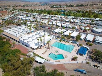 Welcome home to this amazing, rare 16-foot-wide park model with on Riverview Golf Course in Arizona - for sale on GolfHomes.com, golf home, golf lot
