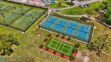Welcome home to this RARE 1 bdrm, 2 full bath condo on the FIRST on Hillsboro Pines Golf in Florida - for sale on GolfHomes.com, golf home, golf lot