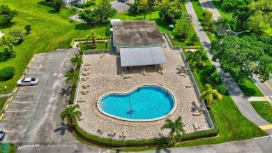 Welcome home to this RARE 1 bdrm, 2 full bath condo on the FIRST on Hillsboro Pines Golf in Florida - for sale on GolfHomes.com, golf home, golf lot