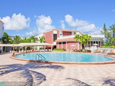 Welcome home to this RARE 1 bdrm, 2 full bath condo on the FIRST on Hillsboro Pines Golf in Florida - for sale on GolfHomes.com, golf home, golf lot