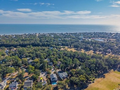 Discover the ultimate coastal retreat in this stunning custom on The Plantation Course At Edisto in South Carolina - for sale on GolfHomes.com, golf home, golf lot