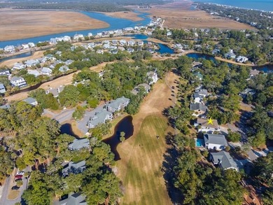 Discover the ultimate coastal retreat in this stunning custom on The Plantation Course At Edisto in South Carolina - for sale on GolfHomes.com, golf home, golf lot