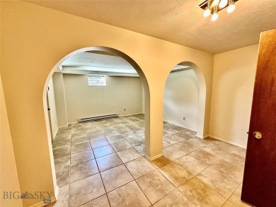 Incredible potential with this 4 bedroom - 2.5 bath home on TWO on Madison Meadows Golf Course in Montana - for sale on GolfHomes.com, golf home, golf lot