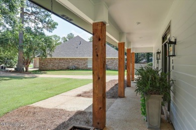 Welcome to 430 Bay Pointe Circle!  This golf course community is on Bay Pointe Golf and Resort in Mississippi - for sale on GolfHomes.com, golf home, golf lot