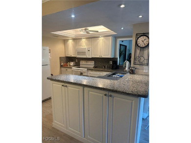 WOW GREAT PRICE!! WOW ITS ALL DONE !! ALL YOU HAVE TO DO IS MOVE on Hideaway Country Club in Florida - for sale on GolfHomes.com, golf home, golf lot