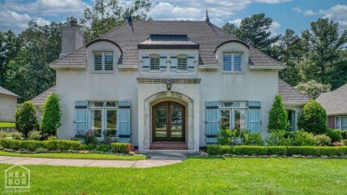 Nestled on a picturesque .33-acre golf course lot with wooded on RidgePointe Country Club in Arkansas - for sale on GolfHomes.com, golf home, golf lot