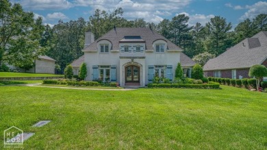 Nestled on a picturesque .33-acre golf course lot with wooded on RidgePointe Country Club in Arkansas - for sale on GolfHomes.com, golf home, golf lot
