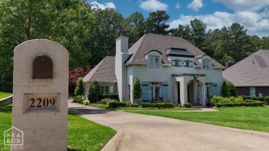 Nestled on a picturesque .33-acre golf course lot with wooded on RidgePointe Country Club in Arkansas - for sale on GolfHomes.com, golf home, golf lot