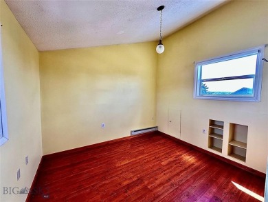 Incredible potential with this 4 bedroom - 2.5 bath home on TWO on Madison Meadows Golf Course in Montana - for sale on GolfHomes.com, golf home, golf lot