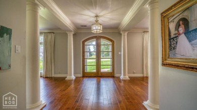 Nestled on a picturesque .33-acre golf course lot with wooded on RidgePointe Country Club in Arkansas - for sale on GolfHomes.com, golf home, golf lot