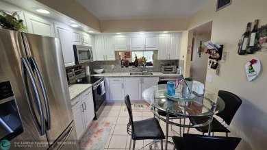 Amazingly appointed split two bedroom two bath large unit on Flamingo Lakes Country Club in Florida - for sale on GolfHomes.com, golf home, golf lot