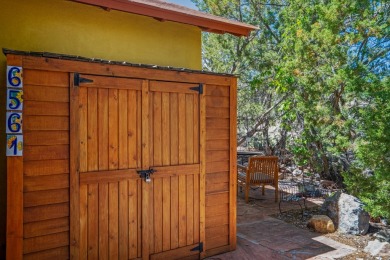 Nestled privately among Pinon and Juniper trees at Cochiti Lake on Pueblo de Cochiti Golf Course in New Mexico - for sale on GolfHomes.com, golf home, golf lot