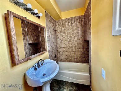 Incredible potential with this 4 bedroom - 2.5 bath home on TWO on Madison Meadows Golf Course in Montana - for sale on GolfHomes.com, golf home, golf lot