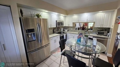 Amazingly appointed split two bedroom two bath large unit on Flamingo Lakes Country Club in Florida - for sale on GolfHomes.com, golf home, golf lot