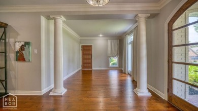 Nestled on a picturesque .33-acre golf course lot with wooded on RidgePointe Country Club in Arkansas - for sale on GolfHomes.com, golf home, golf lot