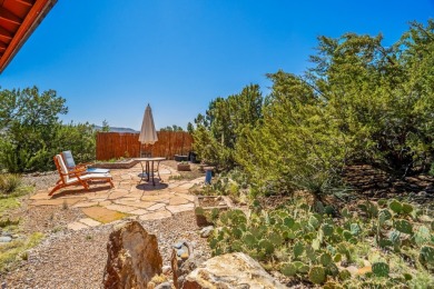 Nestled privately among Pinon and Juniper trees at Cochiti Lake on Pueblo de Cochiti Golf Course in New Mexico - for sale on GolfHomes.com, golf home, golf lot