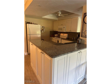 WOW GREAT PRICE!! WOW ITS ALL DONE !! ALL YOU HAVE TO DO IS MOVE on Hideaway Country Club in Florida - for sale on GolfHomes.com, golf home, golf lot