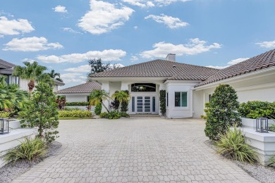 Experience luxury living on the 8th hole of the Match Course in on PGA National Golf Club in Florida - for sale on GolfHomes.com, golf home, golf lot