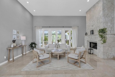 Experience luxury living on the 8th hole of the Match Course in on PGA National Golf Club in Florida - for sale on GolfHomes.com, golf home, golf lot