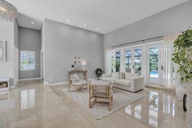 Experience luxury living on the 8th hole of the Match Course in on PGA National Golf Club in Florida - for sale on GolfHomes.com, golf home, golf lot
