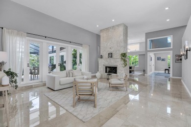 Experience luxury living on the 8th hole of the Match Course in on PGA National Golf Club in Florida - for sale on GolfHomes.com, golf home, golf lot