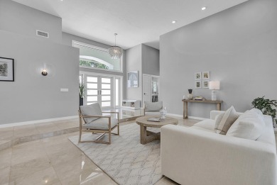 Experience luxury living on the 8th hole of the Match Course in on PGA National Golf Club in Florida - for sale on GolfHomes.com, golf home, golf lot