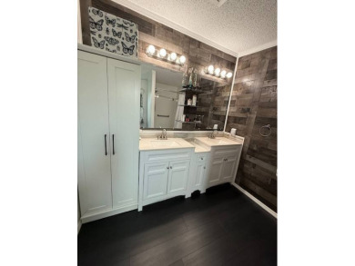 Prepare to be captivated by this **completely reimagined gem** on Hamptons Golf Club in Florida - for sale on GolfHomes.com, golf home, golf lot