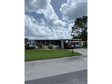 Prepare to be captivated by this **completely reimagined gem** on Hamptons Golf Club in Florida - for sale on GolfHomes.com, golf home, golf lot