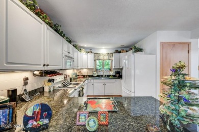 Picture-Perfect Lakefront Retreat! Escape to lakeside bliss with on The Hideout Golf in Pennsylvania - for sale on GolfHomes.com, golf home, golf lot