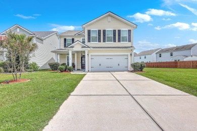 Welcome to this beautiful two-story home perfectly situated on a on Cypress Point Par 3 in South Carolina - for sale on GolfHomes.com, golf home, golf lot