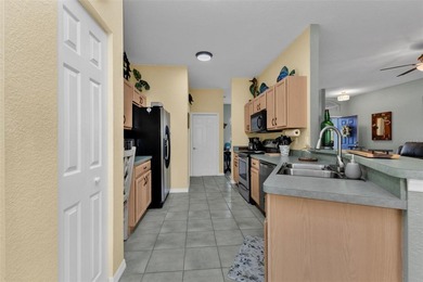 Extremely well cared for and neat-as-a-pin Bristol floorplan now on Kings Gate Golf Club in Florida - for sale on GolfHomes.com, golf home, golf lot