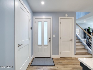 Surround yourself in tasteful luxury in this beautifully on Oceans Golf Club in Florida - for sale on GolfHomes.com, golf home, golf lot