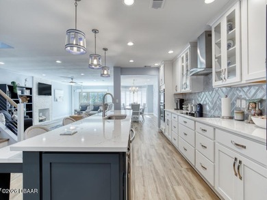 Surround yourself in tasteful luxury in this beautifully on Oceans Golf Club in Florida - for sale on GolfHomes.com, golf home, golf lot