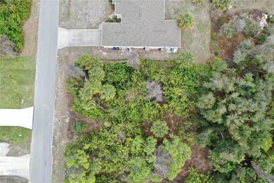 This property on Kenvil Dr is a 10,000 sqft (.23 acre) building on Bobcat Trail Golf Club in Florida - for sale on GolfHomes.com, golf home, golf lot