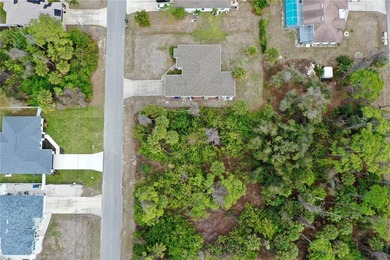 This property on Kenvil Dr is a 10,000 sqft (.23 acre) building on Bobcat Trail Golf Club in Florida - for sale on GolfHomes.com, golf home, golf lot