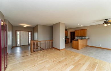 Impeccably maintained and packed with upgrades, this stunning on Willow Creek Golf Course  in Minnesota - for sale on GolfHomes.com, golf home, golf lot