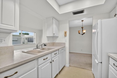Welcome to Leisureville Living! Step into comfort and on Leisureville Community Golf Course in Florida - for sale on GolfHomes.com, golf home, golf lot