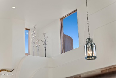 This light and bright custom Santa Fe home is located in the on Desert Mountain Golf Club - Renegade Course in Arizona - for sale on GolfHomes.com, golf home, golf lot