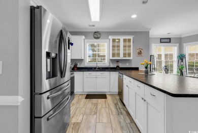 This furnished 3-bedroom, 2-bath condo offers beach living at on Myrtlewood Golf Course and Club  in South Carolina - for sale on GolfHomes.com, golf home, golf lot