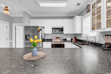 This furnished 3-bedroom, 2-bath condo offers beach living at on Myrtlewood Golf Course and Club  in South Carolina - for sale on GolfHomes.com, golf home, golf lot