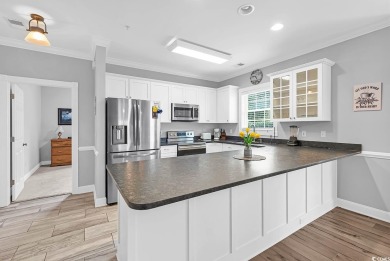 This furnished 3-bedroom, 2-bath condo offers beach living at on Myrtlewood Golf Course and Club  in South Carolina - for sale on GolfHomes.com, golf home, golf lot