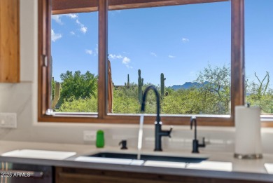 This light and bright custom Santa Fe home is located in the on Desert Mountain Golf Club - Renegade Course in Arizona - for sale on GolfHomes.com, golf home, golf lot