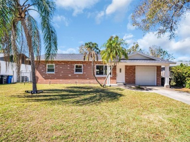 Exquisite Light-Filled Remodeled Home in Clearwater Country Club on Clearwater Country Club in Florida - for sale on GolfHomes.com, golf home, golf lot