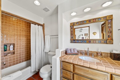 This light and bright custom Santa Fe home is located in the on Desert Mountain Golf Club - Renegade Course in Arizona - for sale on GolfHomes.com, golf home, golf lot
