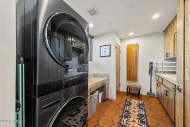 This light and bright custom Santa Fe home is located in the on Desert Mountain Golf Club - Renegade Course in Arizona - for sale on GolfHomes.com, golf home, golf lot
