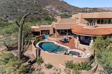 This light and bright custom Santa Fe home is located in the on Desert Mountain Golf Club - Renegade Course in Arizona - for sale on GolfHomes.com, golf home, golf lot
