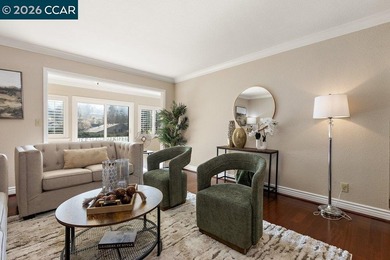 Lower level SIERRA condo in sought after lagoon entry E1 on Rossmoor Golf Course in California - for sale on GolfHomes.com, golf home, golf lot