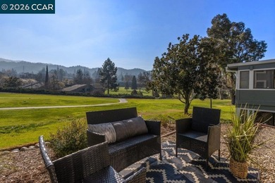 Lower level SIERRA condo in sought after lagoon entry E1 on Rossmoor Golf Course in California - for sale on GolfHomes.com, golf home, golf lot