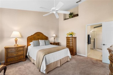 Second-floor end unit with a peaceful lake view and extra on The Club At Grandezza in Florida - for sale on GolfHomes.com, golf home, golf lot